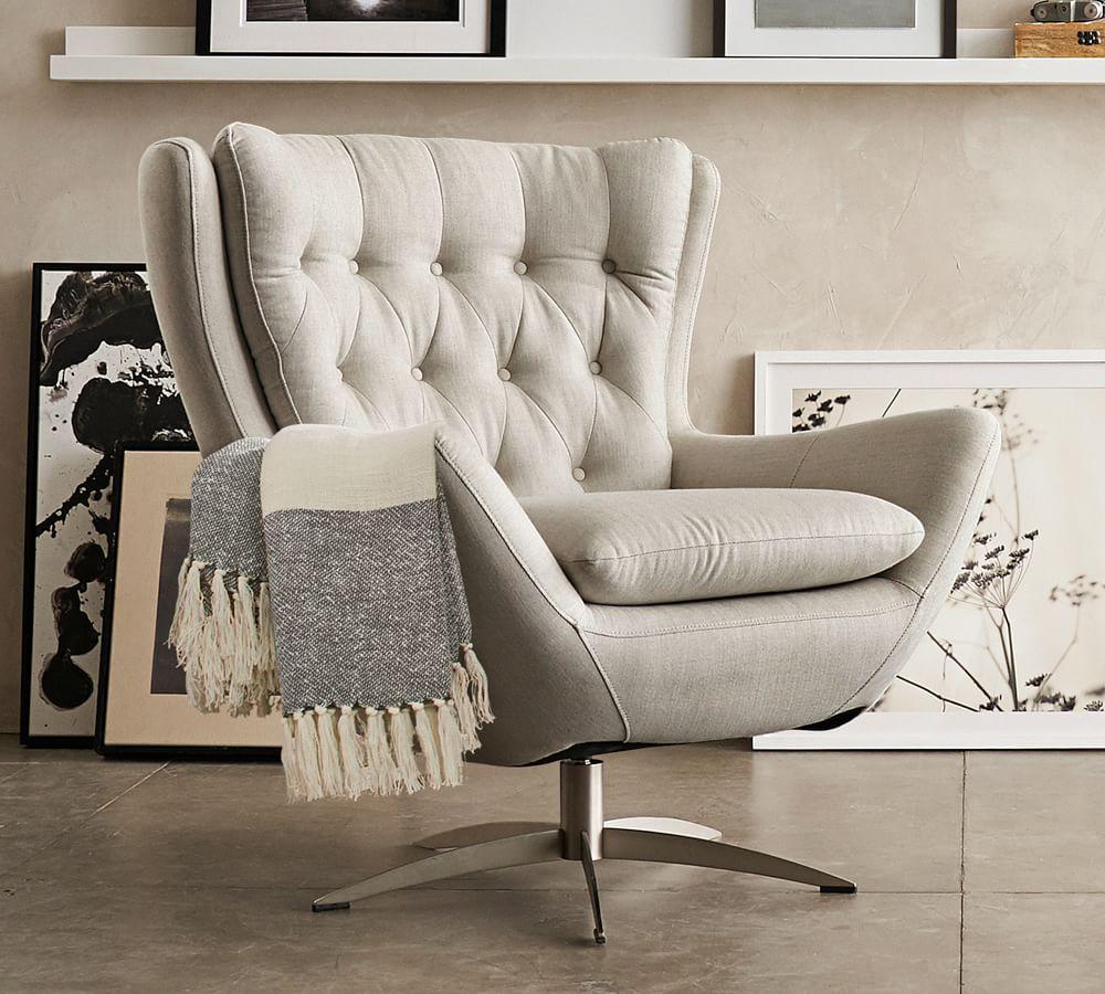 Wells Tufted Upholstered Swivel Armchair